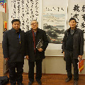 中宣部院秘書(shū)長(zhǎng) 王偉華（中）